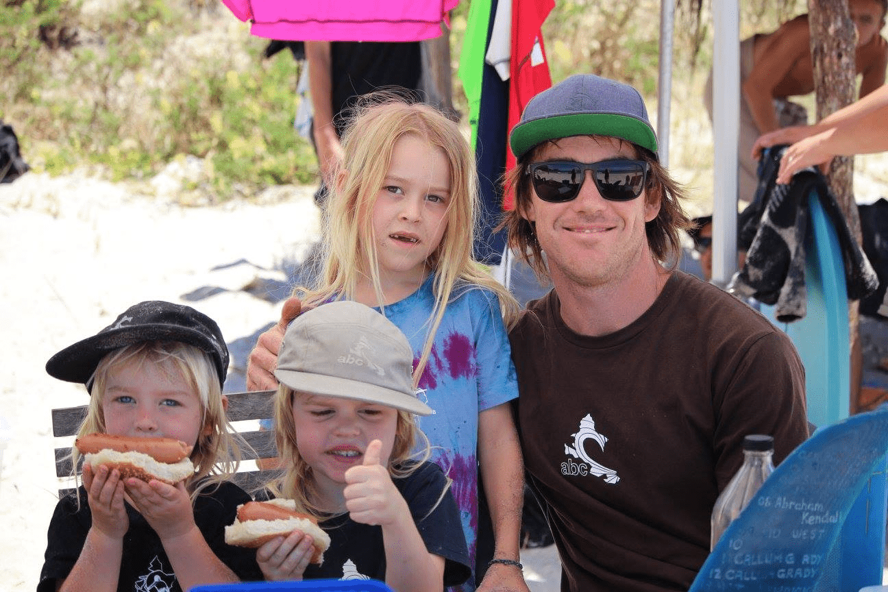 Children on beach for surfing competition Great Barrier Island